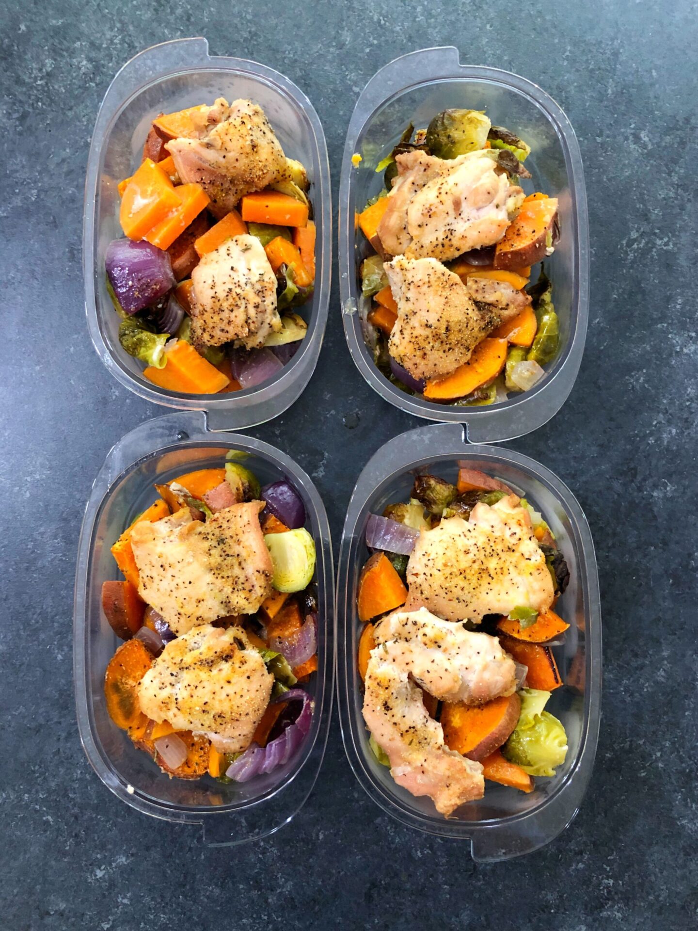 sheet pan dinner meal prep portioned into containers