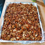 candied mixed nuts on a sheet pan