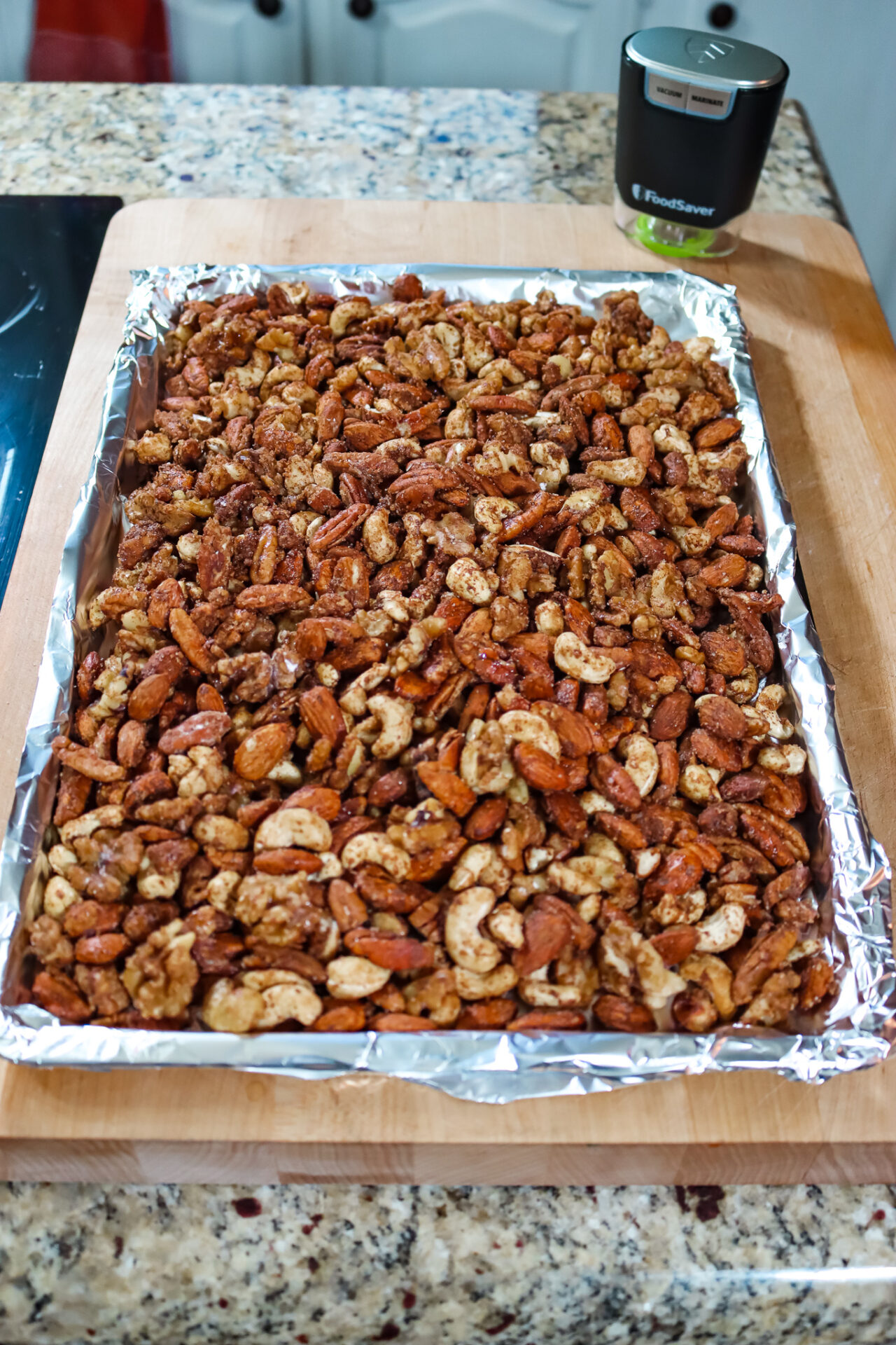 candied mixed nuts on a sheet pan